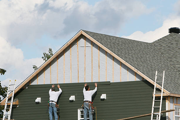 Professional Storm Damage Siding Repair technician working in Burnt Cabins, PA
